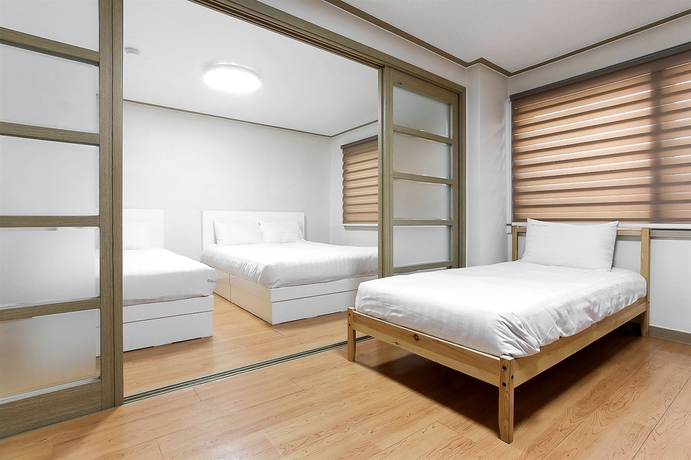 Imagen de la habitación del Hotel Blooming House Residence. Foto 11
