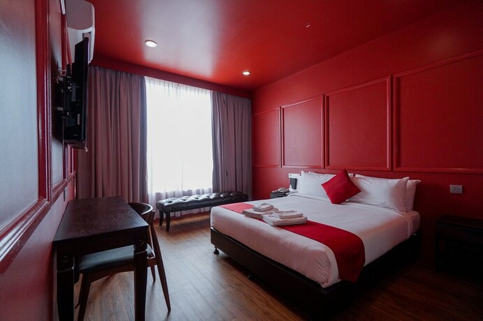 Imagen de la habitación del Hotel Bloommaze Boutique. Foto 12