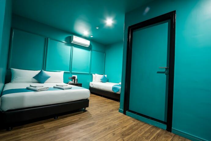 Imagen de la habitación del Hotel Bloommaze Boutique. Foto 13