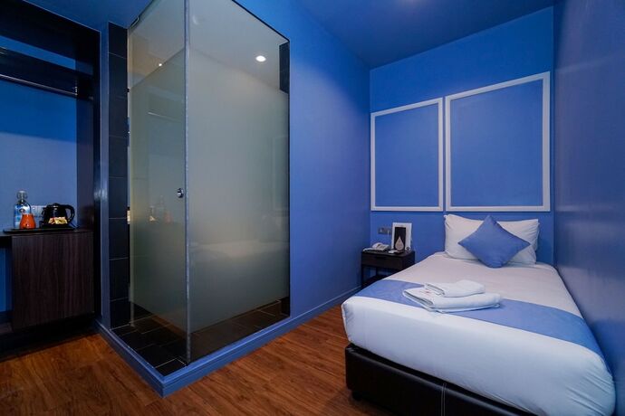 Imagen de la habitación del Hotel Bloommaze Boutique. Foto 16