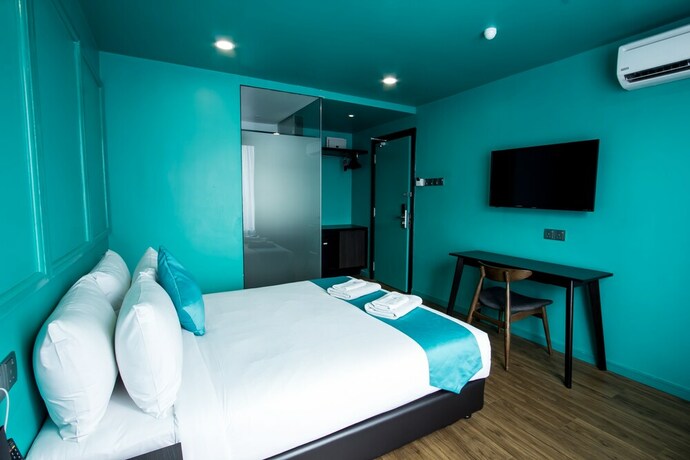 Imagen de la habitación del Hotel Bloommaze Boutique. Foto 17