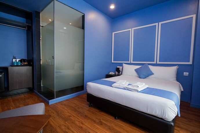 Imagen de la habitación del Hotel Bloommaze Boutique. Foto 19