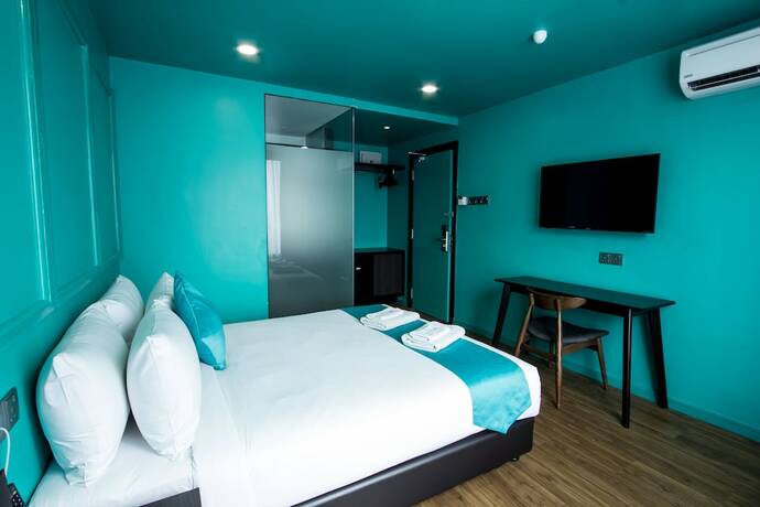 Imagen de la habitación del Hotel Bloommaze Boutique. Foto 23