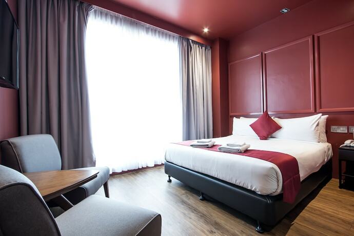 Imagen de la habitación del Hotel Bloommaze Boutique. Foto 24