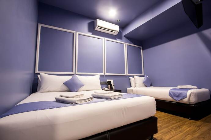 Imagen de la habitación del Hotel Bloommaze Boutique. Foto 26