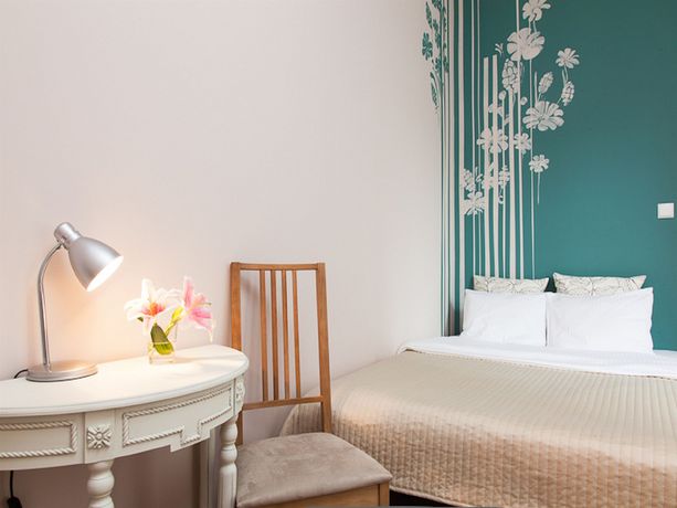 Imagen de la habitación del Hotel Blooms Inn and Apartments. Foto 2