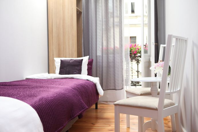 Imagen de la habitación del Hotel Blooms Inn and Apartments. Foto 3