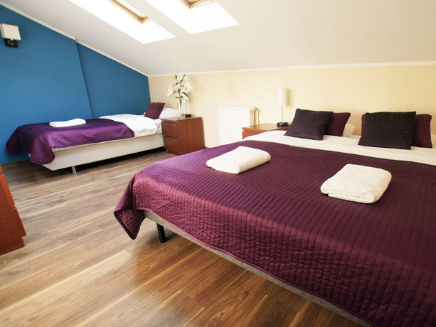 Imagen de la habitación del Hotel Blooms Inn and Apartments. Foto 6