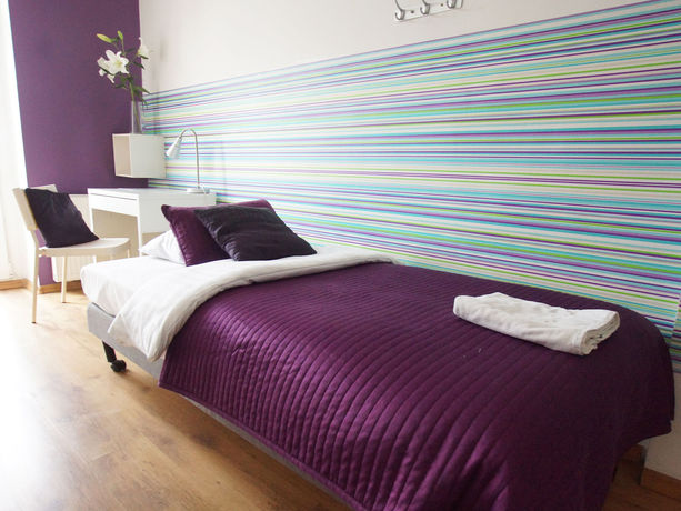 Imagen de la habitación del Hotel Blooms Inn and Apartments. Foto 10