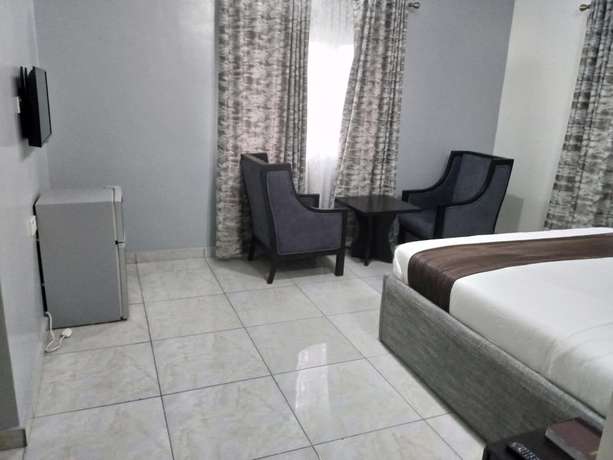 Imagen de la habitación del Hotel Blooms Spot and Apartments. Foto 5