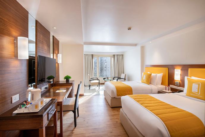 Imagen de la habitación del Hotel Bloomsuites - Ahmedabad. Foto 5