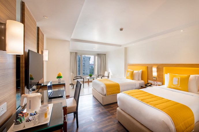 Imagen de la habitación del Hotel Bloomsuites - Ahmedabad. Foto 7