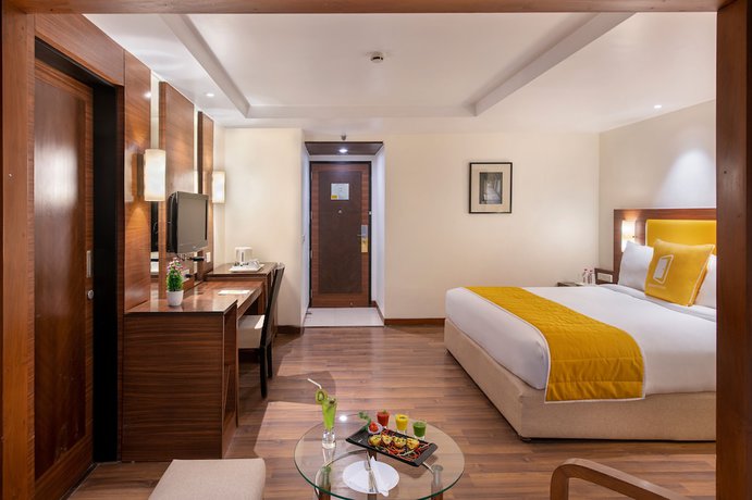Imagen de la habitación del Hotel Bloomsuites - Ahmedabad. Foto 13