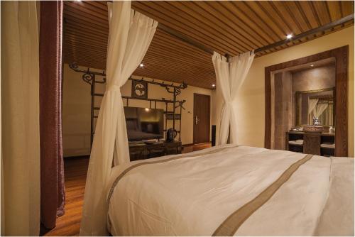 Imagen de la habitación del Hotel Blossom Dynasty Inn. Foto 7