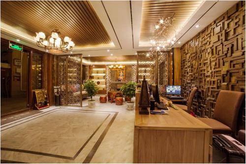 Imagen de la habitación del Hotel Blossom Dynasty Inn. Foto 10