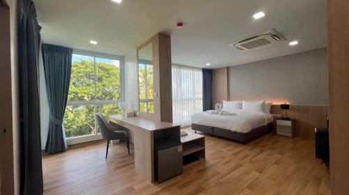 Imagen de la habitación del Hotel โรงแรมบลอสซั่ม เพชรบูรณ์ Blossom. Foto 18