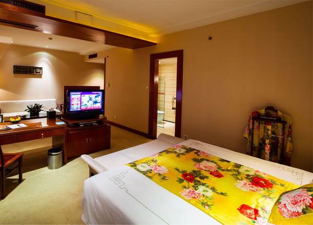 Imagen de la habitación del Hotel Blossom - Hangzhou. Foto 2