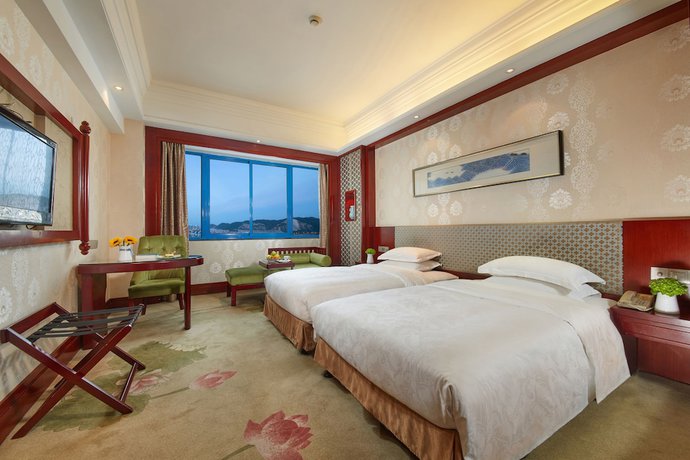 Imagen de la habitación del Hotel Blossom - Hangzhou. Foto 10