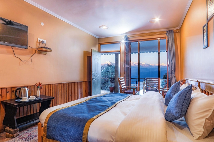 Imagen de la habitación del Hotel Blossom Hideaway Kausani. Foto 4