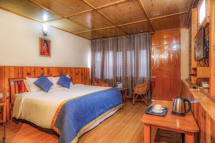 Imagen de la habitación del Hotel Blossom Hideaway Kausani. Foto 5
