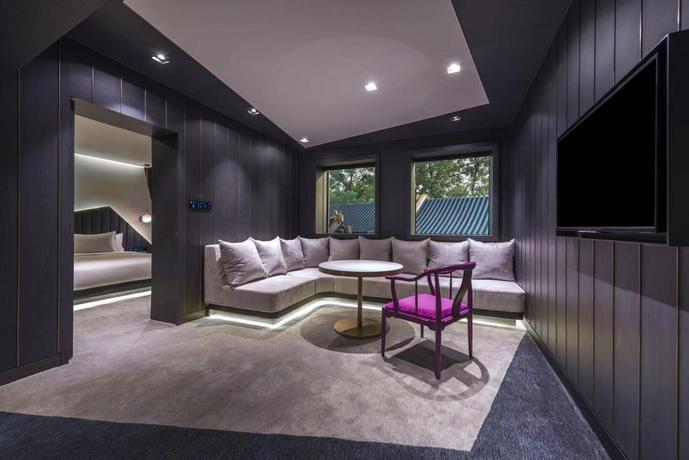 Imagen de la habitación del Hotel Blossom House Beijing Houhai. Foto 4