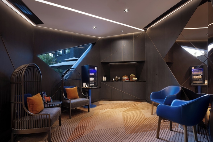 Imagen de los interiores del Hotel Blossom House Beijing Houhai. Foto 13