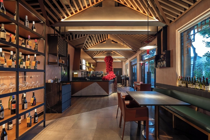 Imagen del bar/restaurante del Hotel Blossom House Beijing Houhai. Foto 5