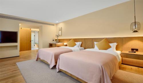Imagen de la habitación del Hotel Blossom House Suzhou. Foto 13