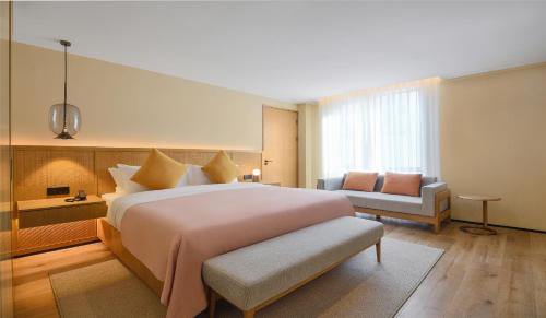 Imagen de la habitación del Hotel Blossom House Suzhou. Foto 14