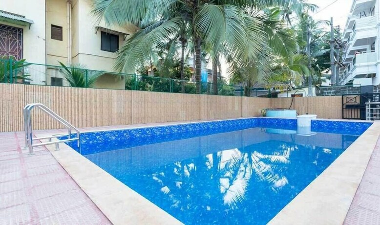 Imagen de la piscina del Hotel Blossom Resort Goa. Foto 18