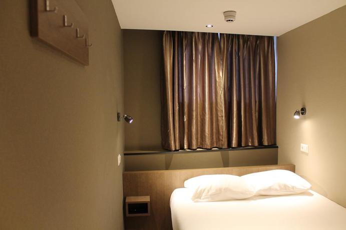 Imagen de la habitación del Hotel Blossoms City. Foto 2