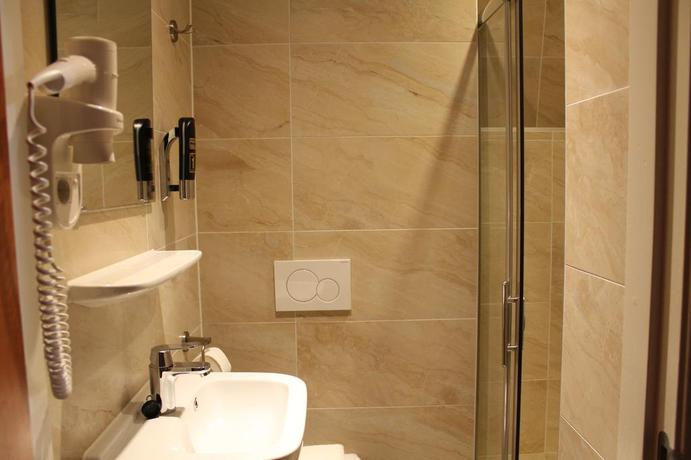 Imagen de la habitación del Hotel Blossoms City. Foto 7