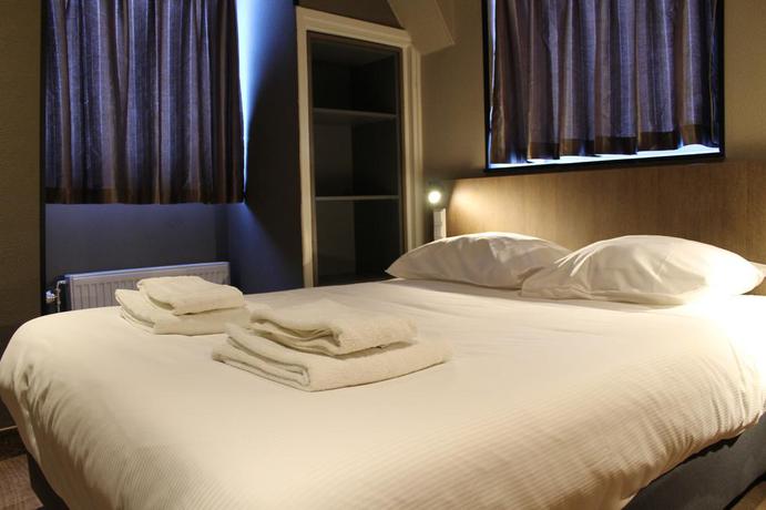 Imagen de la habitación del Hotel Blossoms City. Foto 9