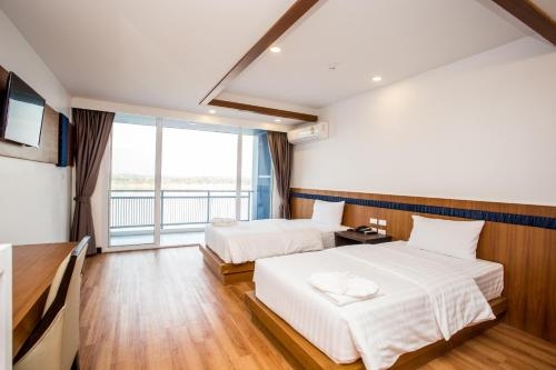 Imagen de la habitación del Hotel Blu, Nakhon Phanom. Foto 8