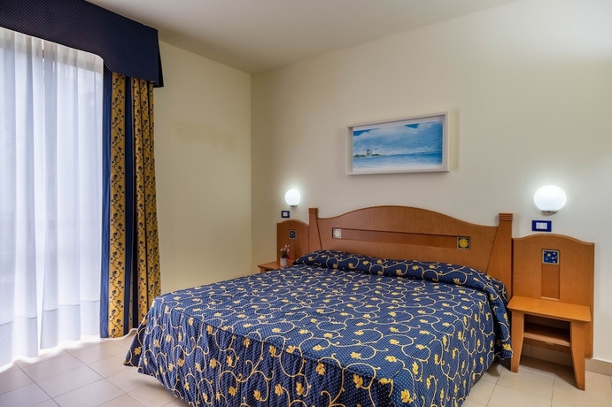 Imagen de la habitación del Hotel Blu Salento Village. Foto 7