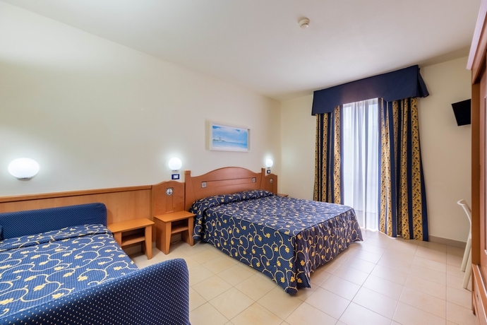 Imagen de la habitación del Hotel Blu Salento Village. Foto 10