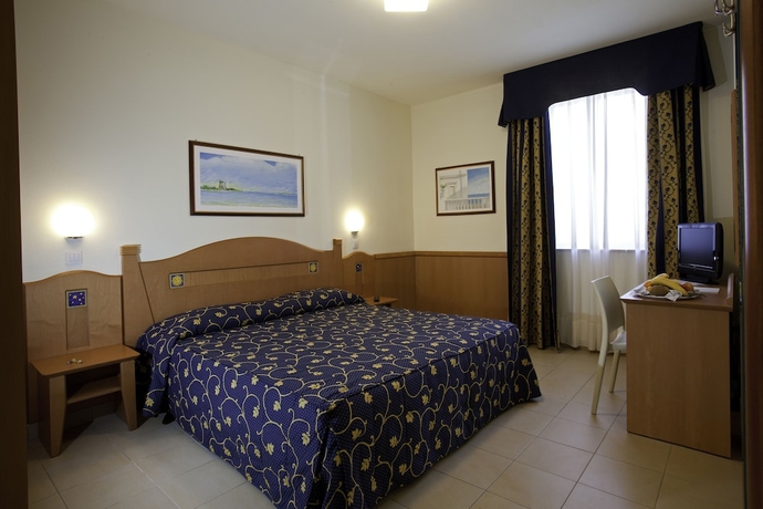 Imagen de la habitación del Hotel Blu Salento Village. Foto 13