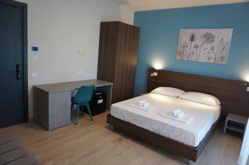 Imagen de la habitación del Hotel BluMarine. Foto 18