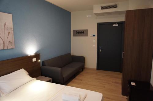 Imagen de la habitación del Hotel BluMarine. Foto 19