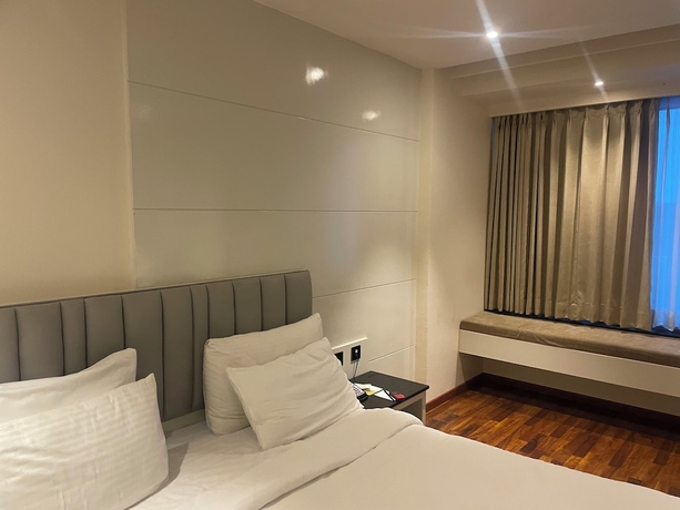 Imagen de la habitación del Hotel BluO Shiv Ganga River View. Foto 2