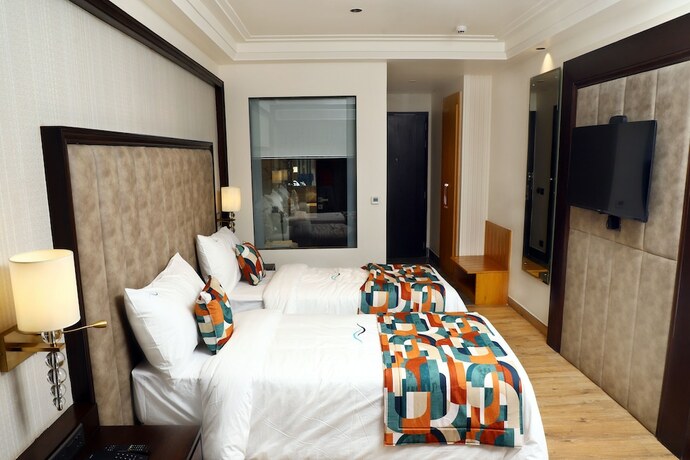 Imagen de la habitación del Hotel BluSalzz Residence Amritsar. Foto 8