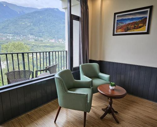 Imagen de la habitación del Hotel BluSalzz Vine Hills Resort, Manali. Foto 16