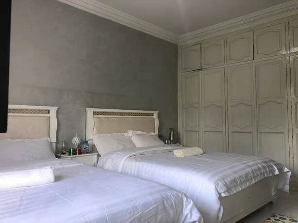 Imagen de la habitación del Hotel Blue And White House. Foto 14