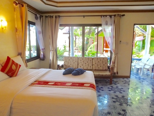 Imagen de la habitación del Hotel Blue Andaman Lanta Resort. Foto 17