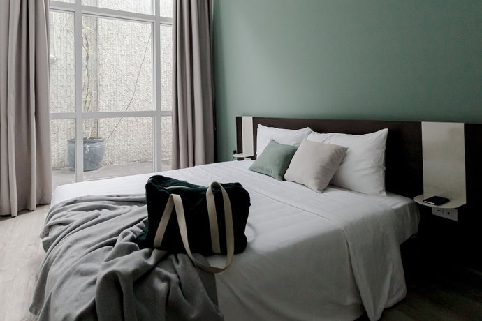 Imagen de la habitación del Hotel Blue Arch Suites - The Notre Dame Saigon. Foto 4