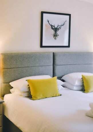 Imagen de la habitación del Hotel Blue Ball Inn. Foto 16