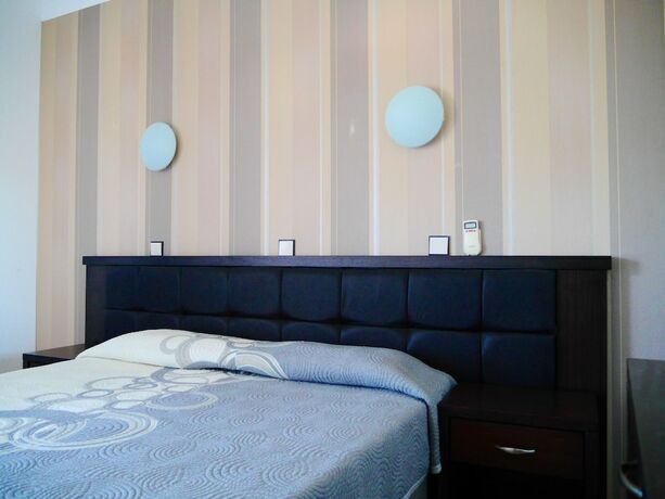 Imagen de la habitación del Hotel Blue Bay Beach. Foto 11