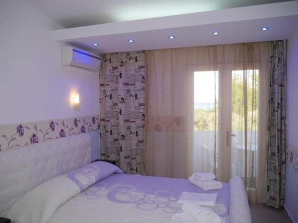 Imagen de la habitación del Hotel Blue Bay Beach. Foto 12