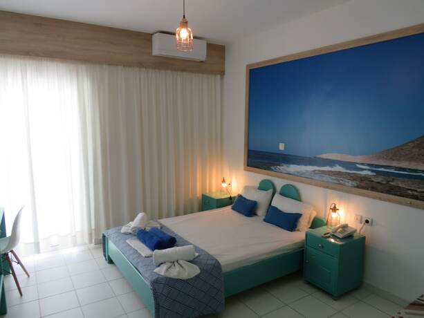Imagen de la habitación del Hotel Blue Beach Villas Apartments. Foto 17