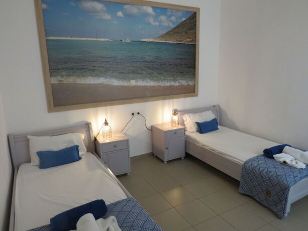 Imagen de la habitación del Hotel Blue Beach Villas Apartments. Foto 20